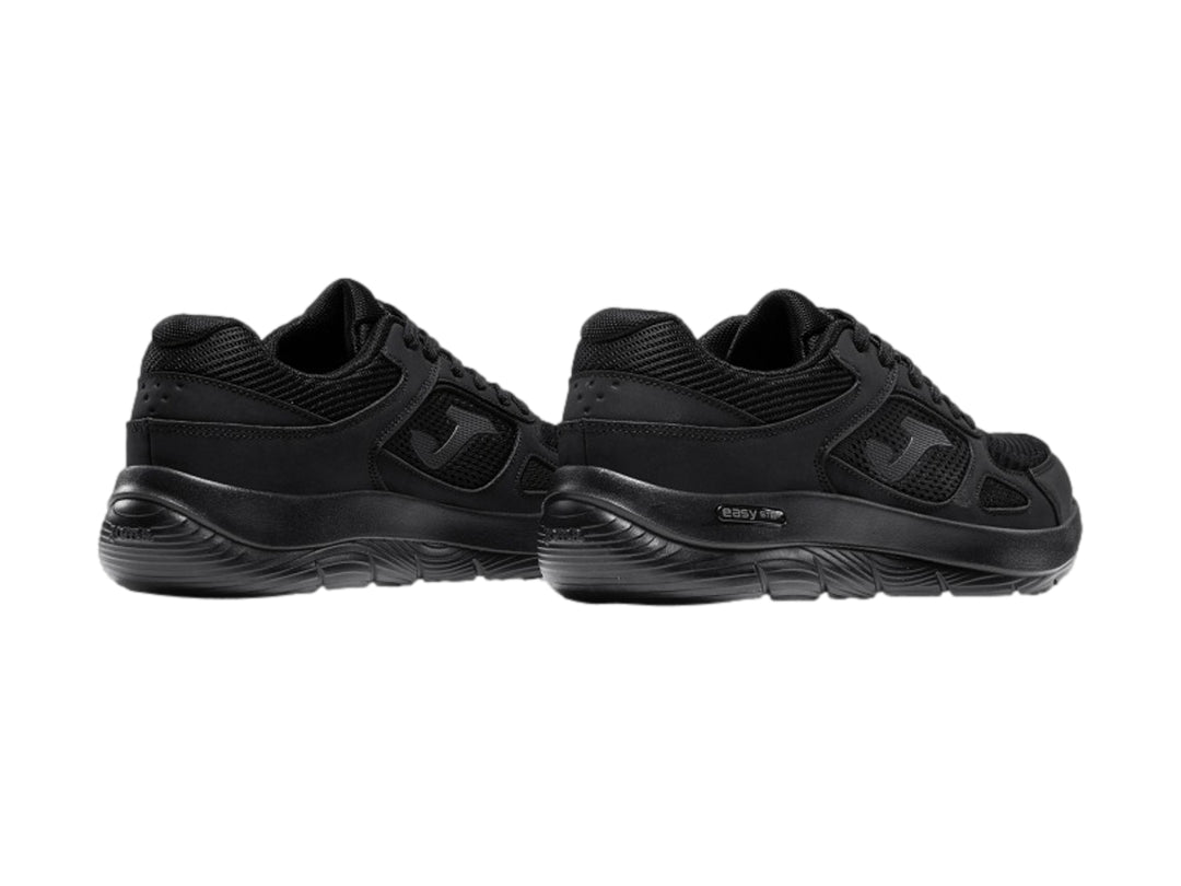 Tenis deportivos Joma Eros en color negro para hombre, vista lateral.