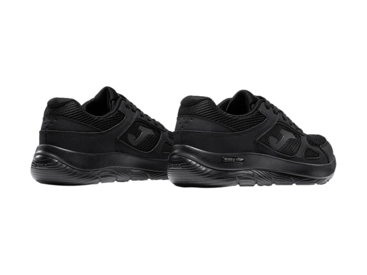 Tenis deportivos Joma Eros en color negro para hombre, vista lateral.