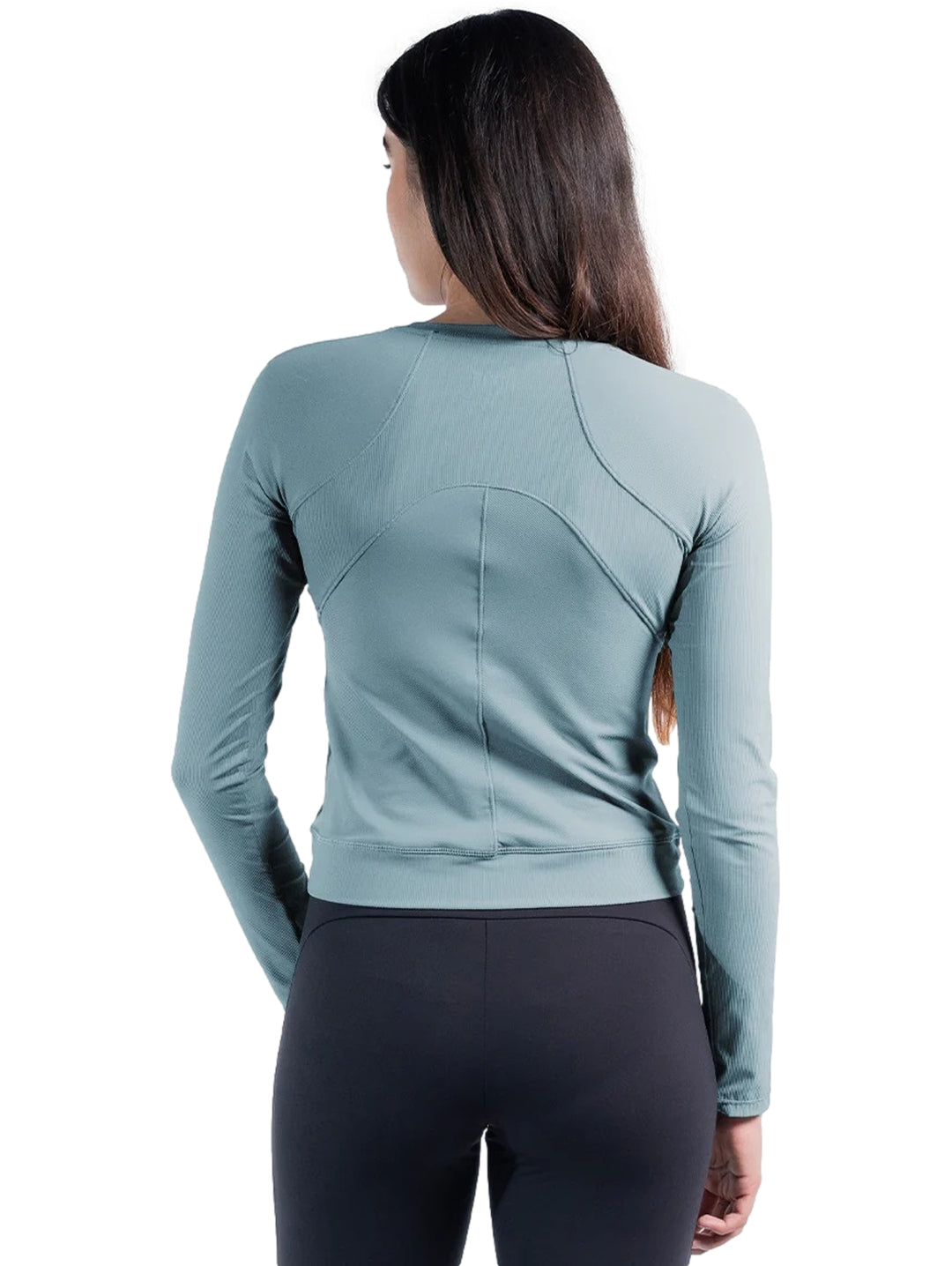 Playera deportiva de manga larga color azul para mujer, ajustada al cuerpo con detalle cruzado en la cintura.