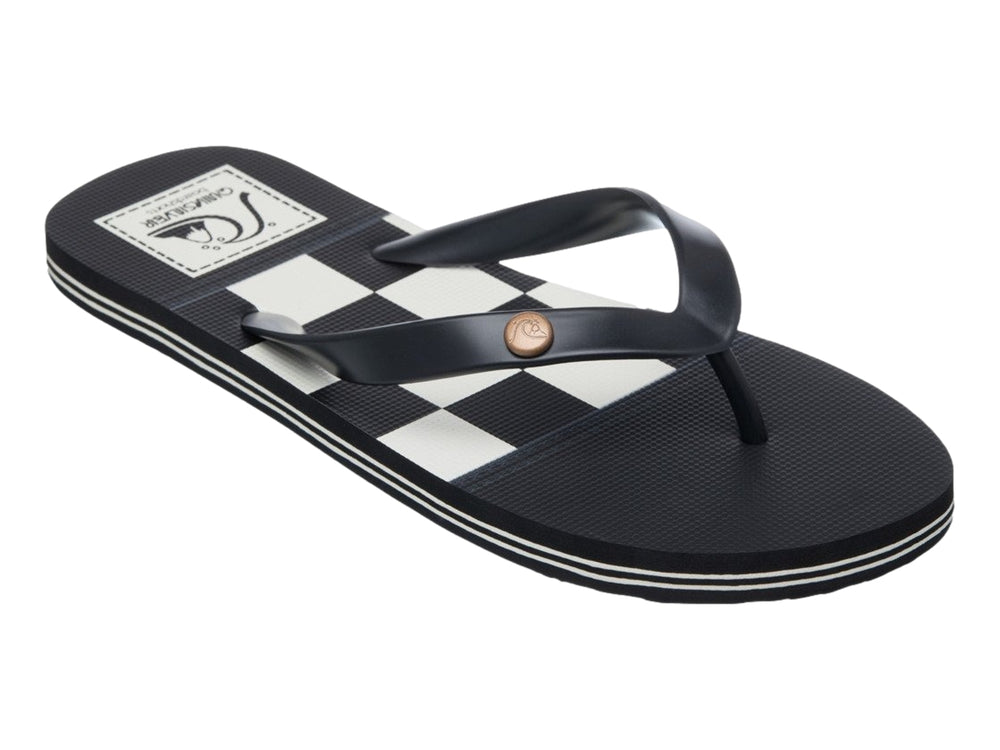 Sandalia Quiksilver Molokai Originals color negro con franja blanca en la suela, vista lateral.