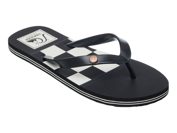 Sandalia Quiksilver Molokai Originals color negro con franja blanca en la suela, vista lateral.