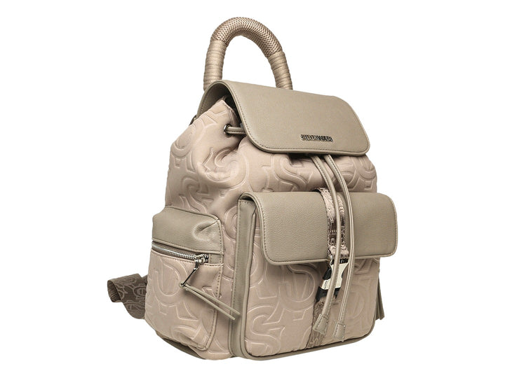 Mochila Steve Madden color taupe con diseño gofrado, asa superior y bolsillos frontales y laterales.