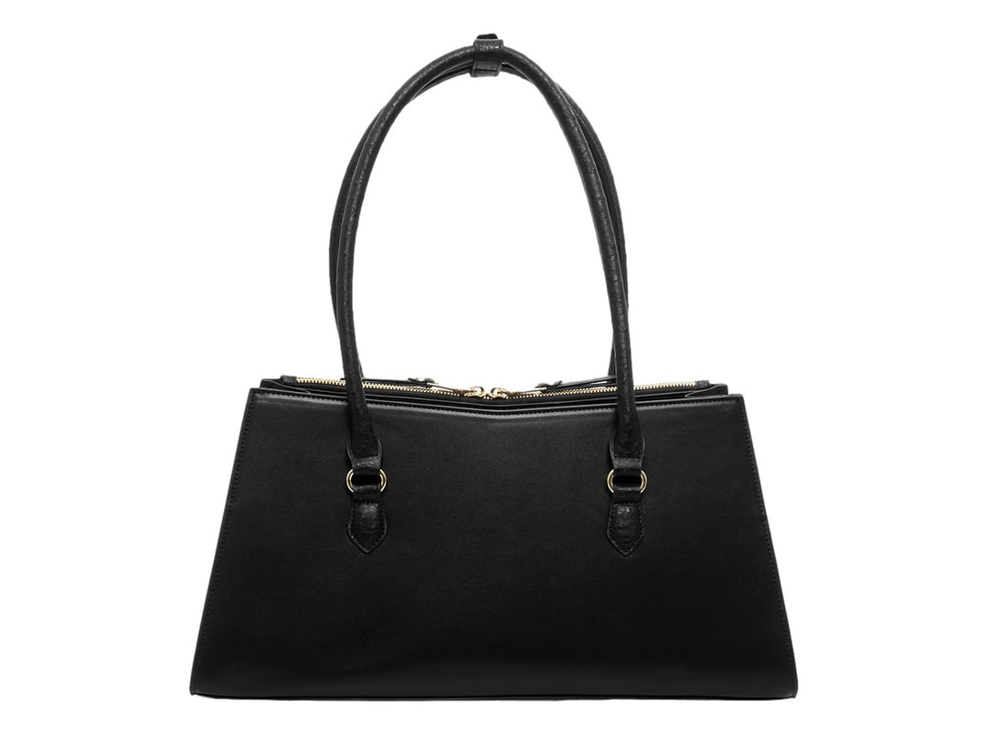 Bolso de mano Steve Madden color negro con detalles y herrajes en tono dorado.