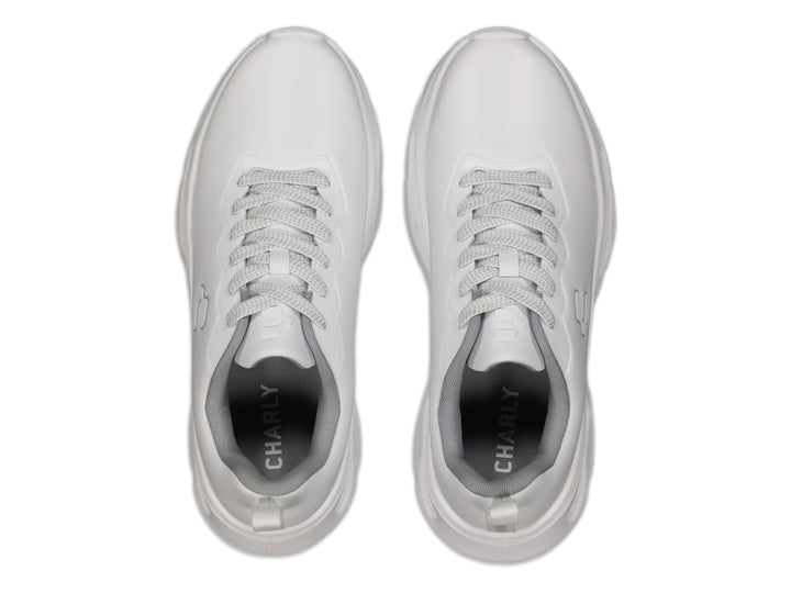 Tenis deportivos Charly Light Sport en color blanco con suela gruesa y diseño moderno.