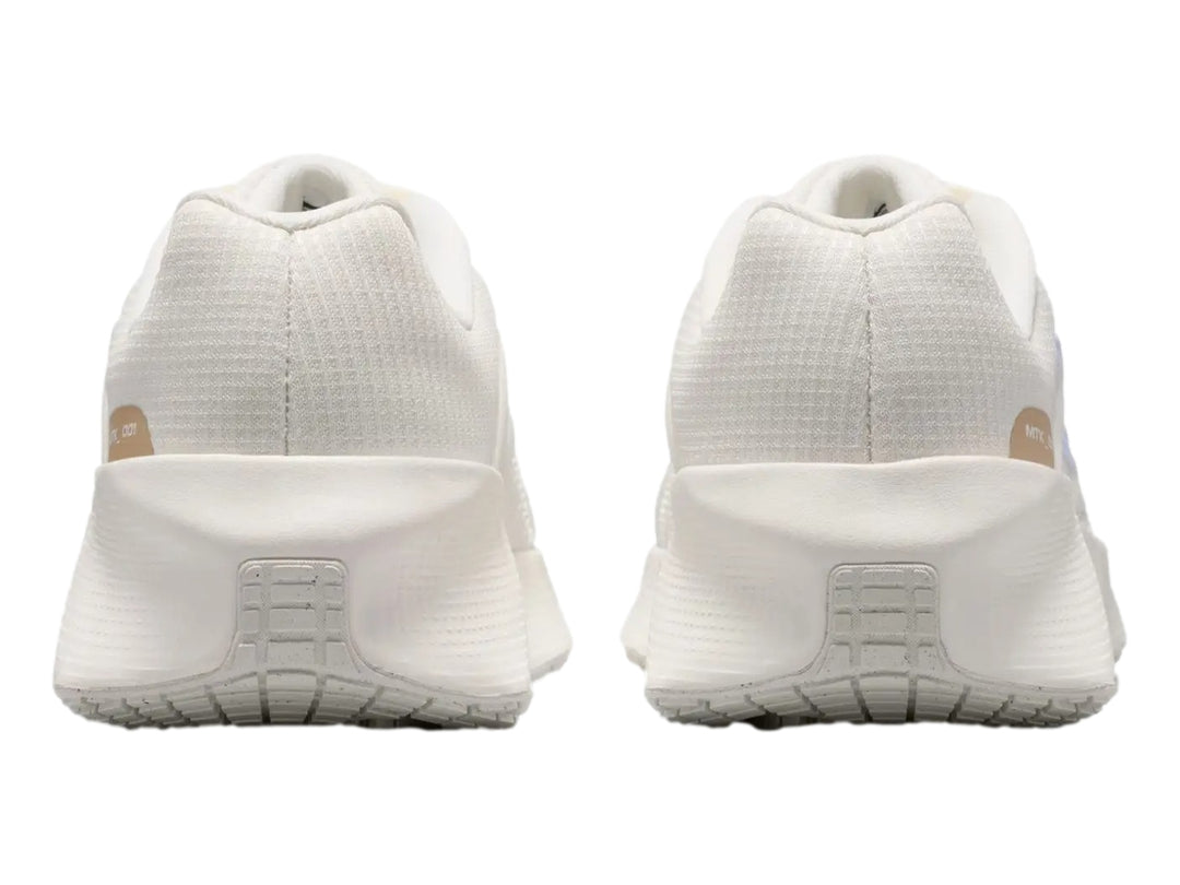 Tenis Nike Metro Tek para mujer en color blanco sail con detalles y logo en azul claro.