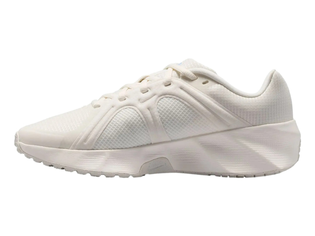 Tenis Nike Metro Tek para mujer en color blanco sail con detalles y logo en azul claro.