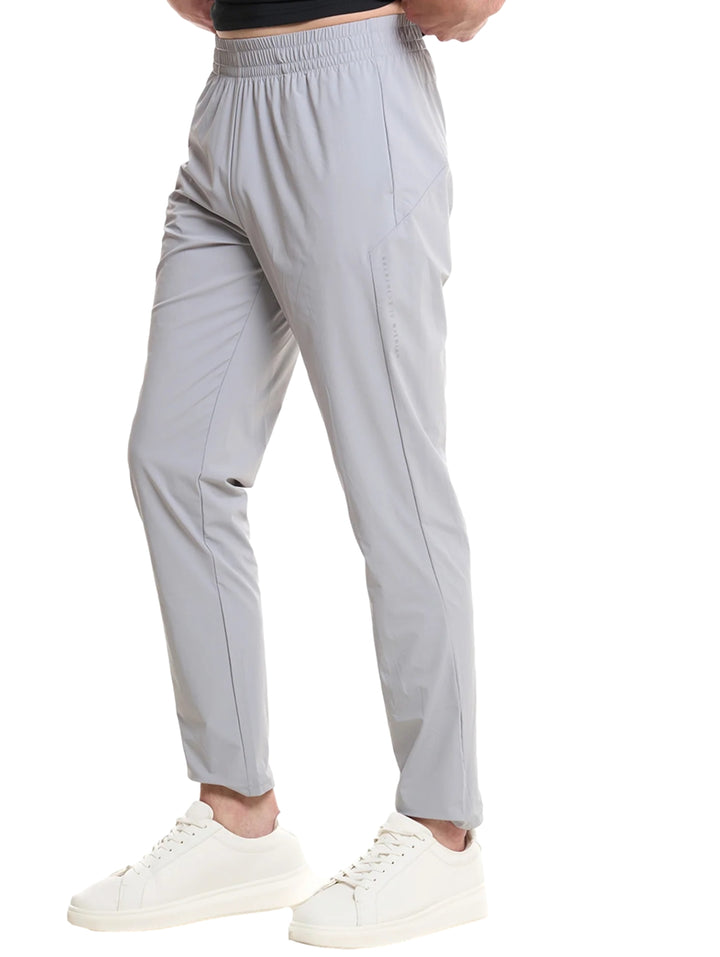 Pantalones deportivos Everlast color gris para hombre con corte ajustado y cintura elástica.