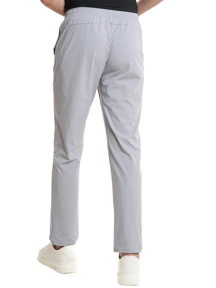 Pantalones deportivos Everlast color gris para hombre con corte ajustado y cintura elástica.