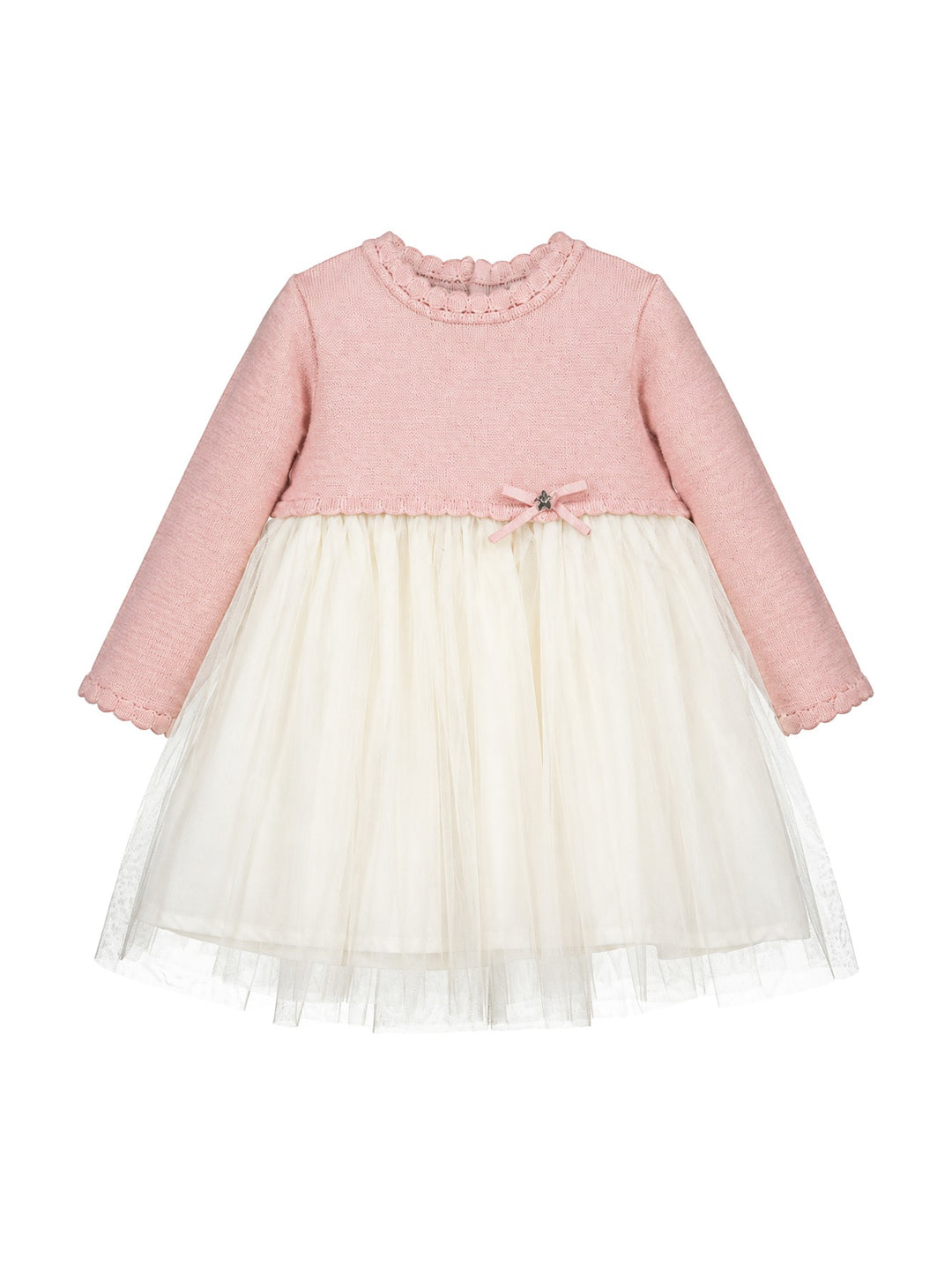 Vestido para niña Mayoral con parte superior tejida en color rosa y falda de tul blanco con un pequeño moño decorativo.