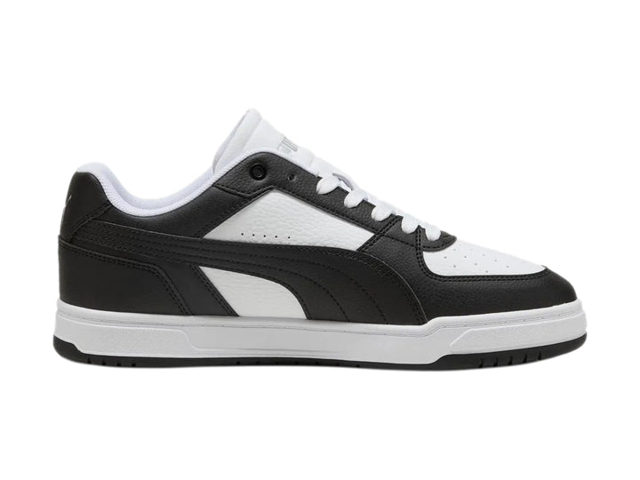 Tenis Puma Caven III para hombre en colores blanco y negro con suela blanca.