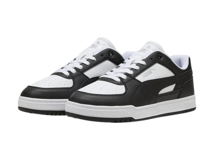 Tenis Puma Caven III para hombre en colores blanco y negro con suela blanca.