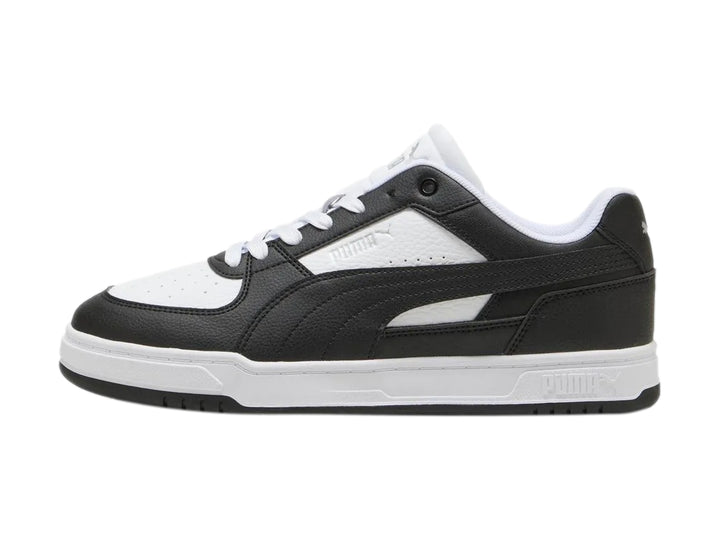 Tenis Puma Caven III para hombre en colores blanco y negro con suela blanca.