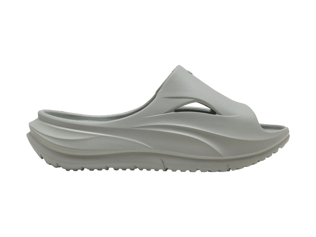 Sandalia PUMA Softride Zerog Slide para hombre en color gris humo, vista lateral.
