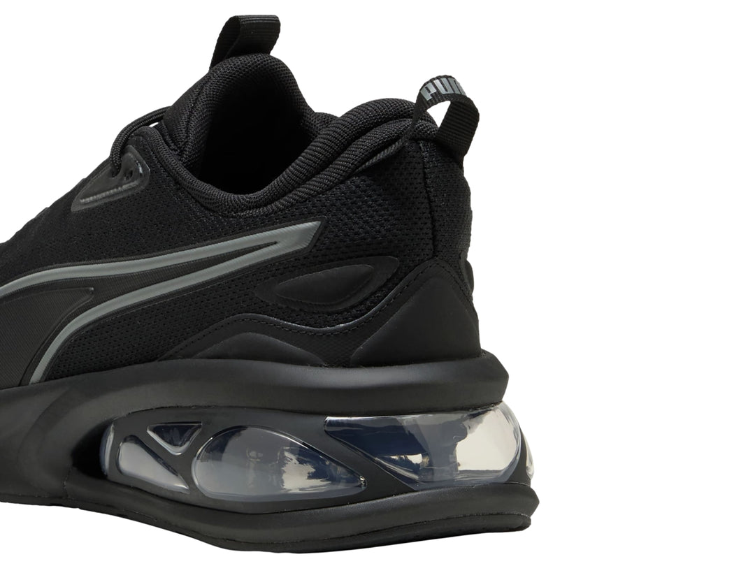 Tenis Puma Solar color negro con detalles en gris y suela con cámara de aire transparente para hombre.
