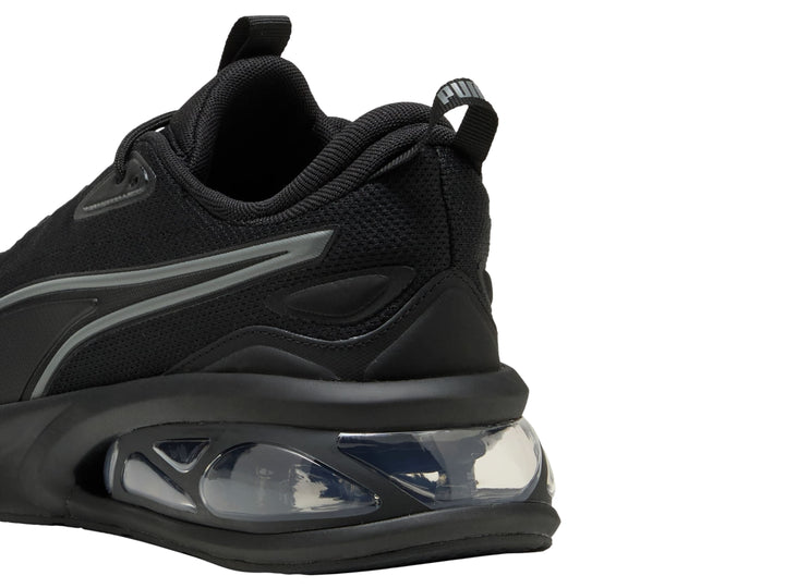Tenis Puma Solar color negro con detalles en gris y suela con cámara de aire transparente para hombre.
