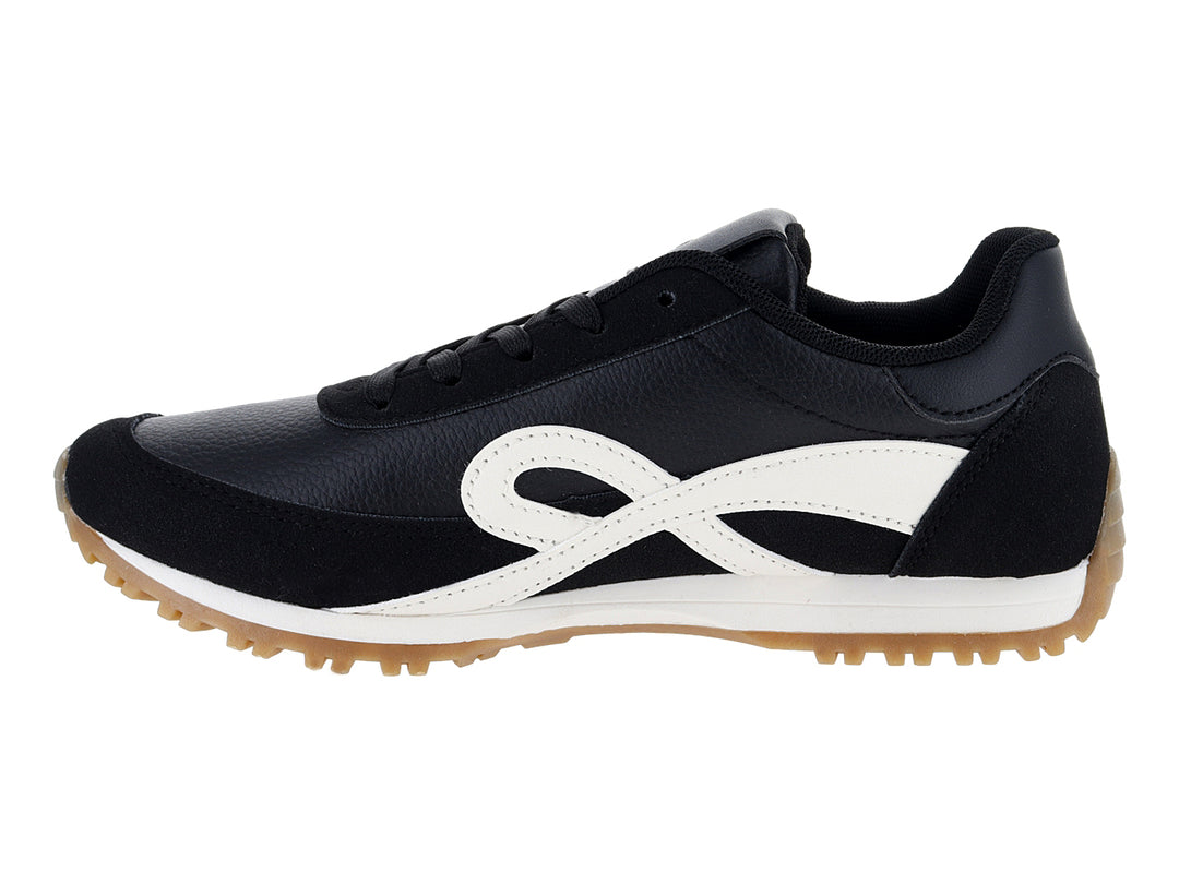 Tenis deportivos Boullevard color negro con detalle blanco lateral y suela color caramelo.