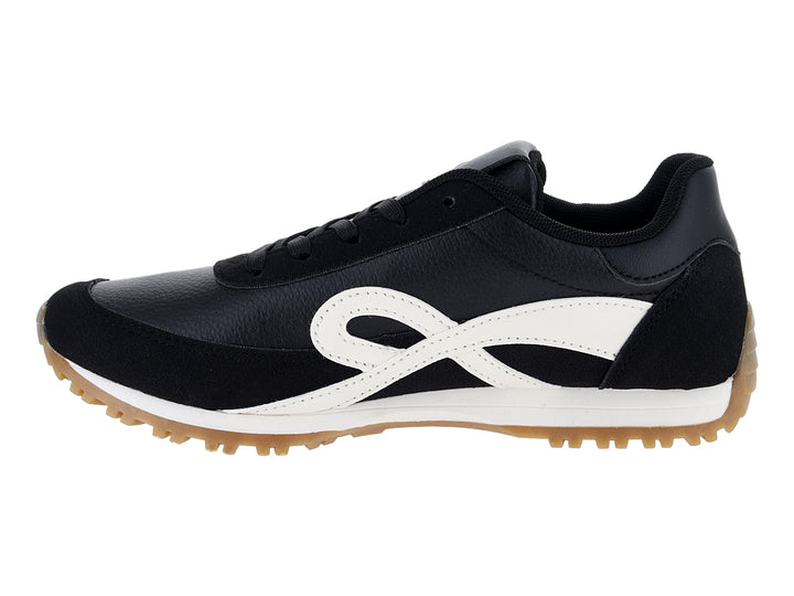 Tenis deportivos Boullevard color negro con detalle blanco lateral y suela color caramelo.