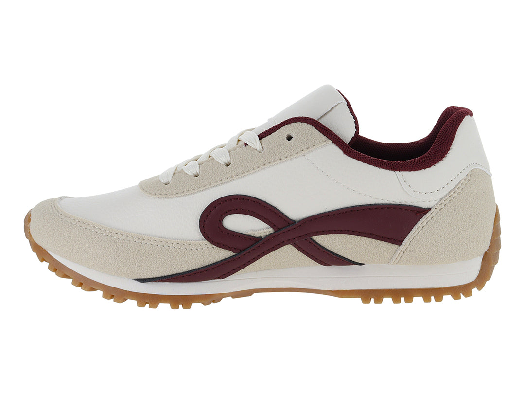 Tenis color beige con detalles en color vino y suela color caramelo.