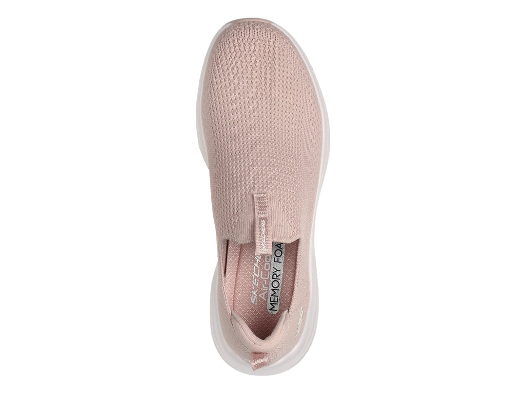 Tenis Skechers rosa para mujer, estilo slip-on con suela blanca y tejido transpirable.