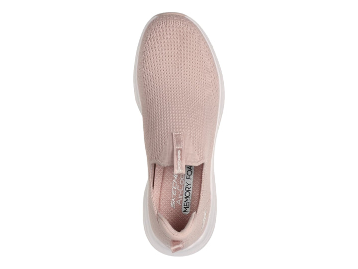 Tenis Skechers rosa para mujer, estilo slip-on con suela blanca y tejido transpirable.