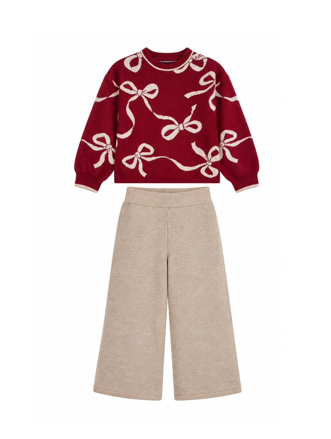 Conjunto de ropa Mayoral compuesto por suéter color framboise con estampado de lazos blancos y pantalón ancho beige.