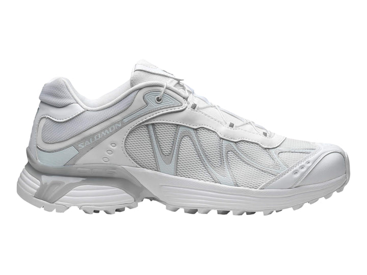 Tenis Salomon XT-Whisper color blanco para mujer con diseño deportivo y malla transpirable.