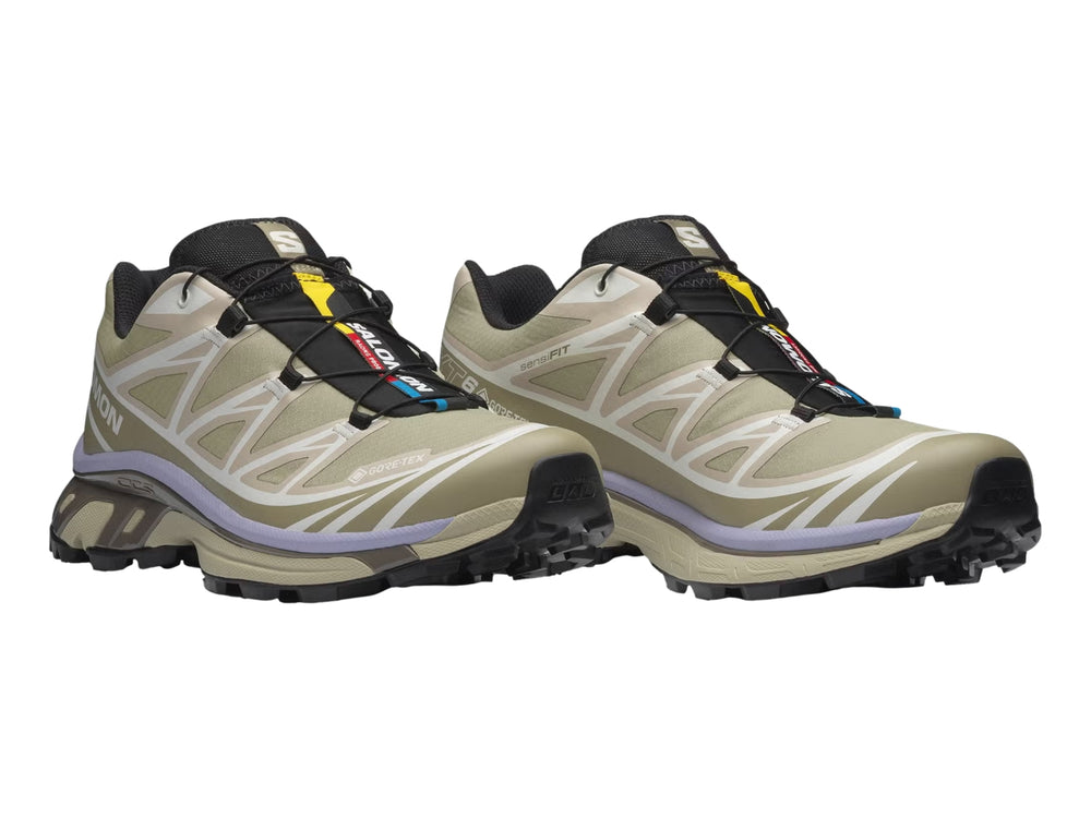 Tenis Salomon XT-6 GTX color verde eucalipto para mujer, vista lateral sobre fondo blanco.