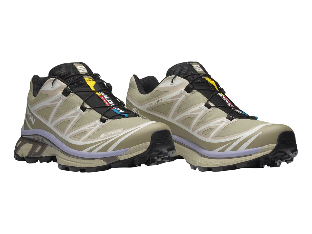 Tenis Salomon XT-6 GTX color verde eucalipto para mujer, vista lateral sobre fondo blanco.