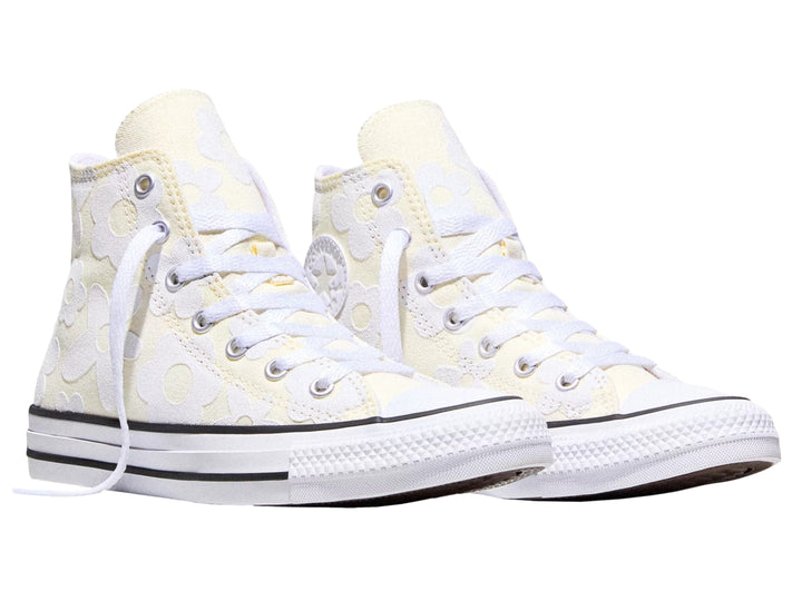 Tenis Converse Chuck Taylor All Star Hi blancos con estampado de flores para niña.