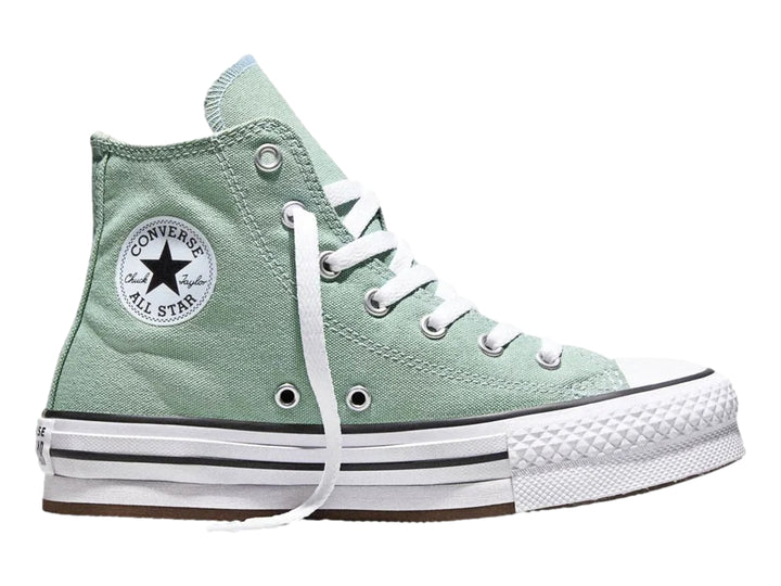 Tenis Converse de bota color verde con suela de plataforma blanca para niña.