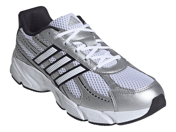 Tenis Adidas Technocaos 2000 color blanco y plata con franjas negras y suela blanca.