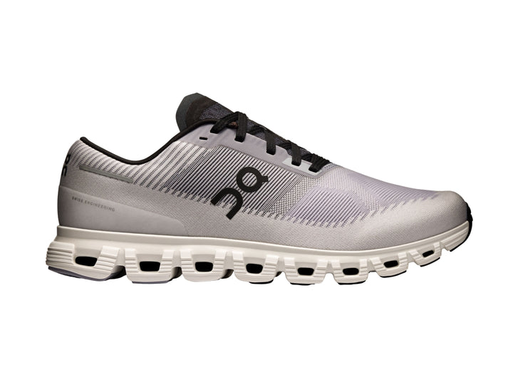 Tenis deportivos On Cloud 6 Push color lila con detalles negros y suela blanca para hombre.