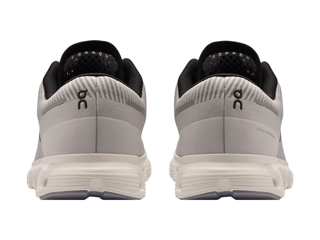 Tenis deportivos On Cloud 6 Push color lila con detalles negros y suela blanca para hombre.