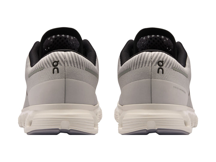 Tenis deportivos On Cloud 6 Push color lila con detalles negros y suela blanca para hombre.