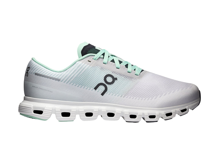Tenis deportivos On Cloud 6 Push color blanco y azul claro con suela blanca y detalles negros.