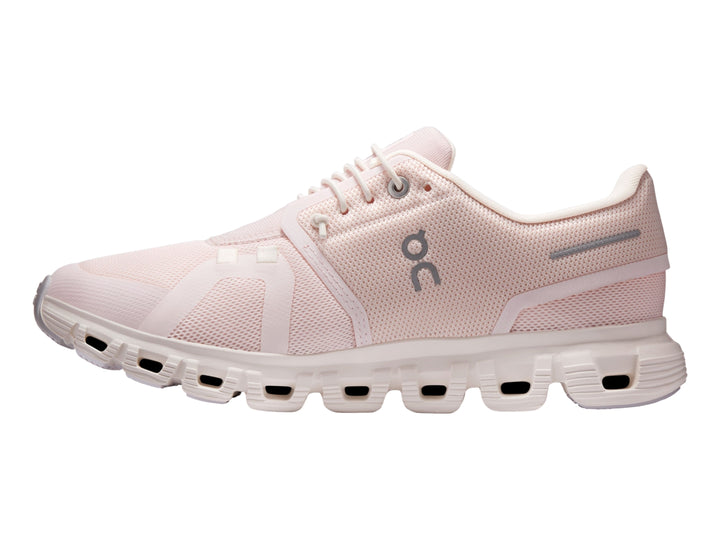 Tenis deportivos On Cloud 6 color rosa claro y blanco para mujer con suela amortiguada.