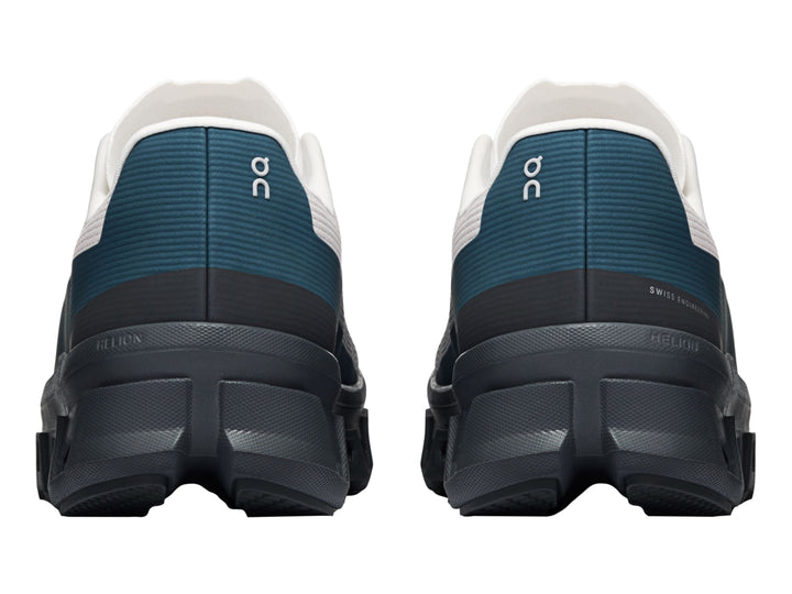 Tenis On Cloud Cloudmonster Void color plata y gris oscuro con detalles azules y suela CloudTec.