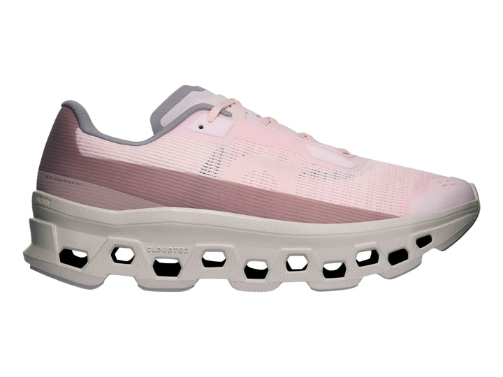 Tenis deportivos On Cloud Cloudmonster Void para mujer en color rosa pálido y blanco hueso.