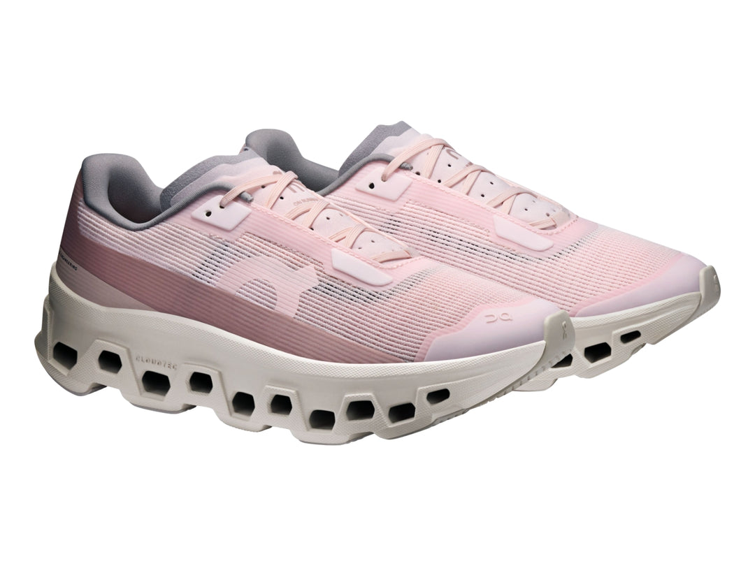 Tenis deportivos On Cloud Cloudmonster Void para mujer en color rosa pálido y blanco hueso.