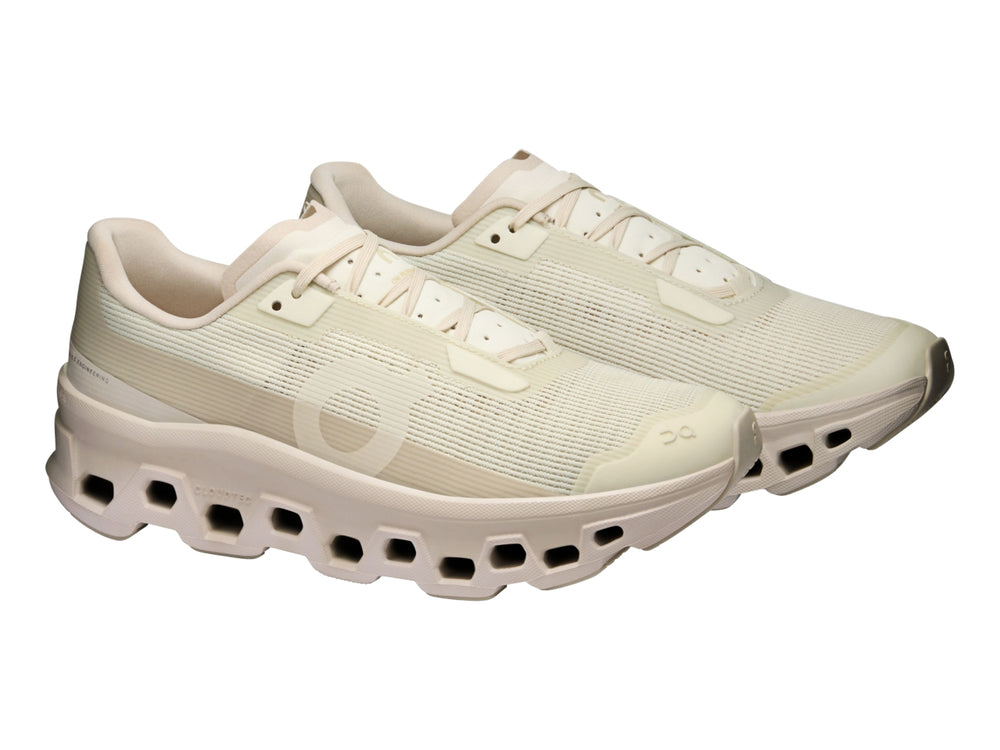 Tenis deportivos On Cloud Cloudmonster Void color perla para mujer con suela amortiguada característica.