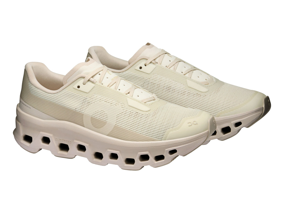 Tenis deportivos On Cloud Cloudmonster Void color perla para mujer con suela amortiguada característica.