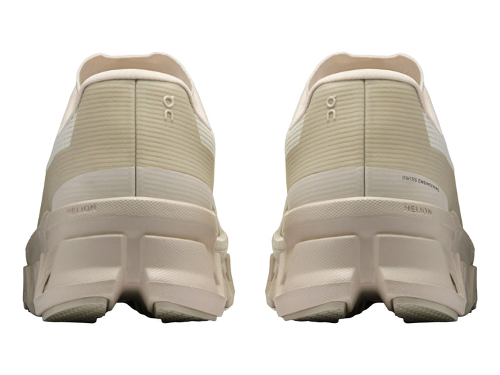 Tenis deportivos On Cloud Cloudmonster Void color perla para mujer con suela amortiguada característica.