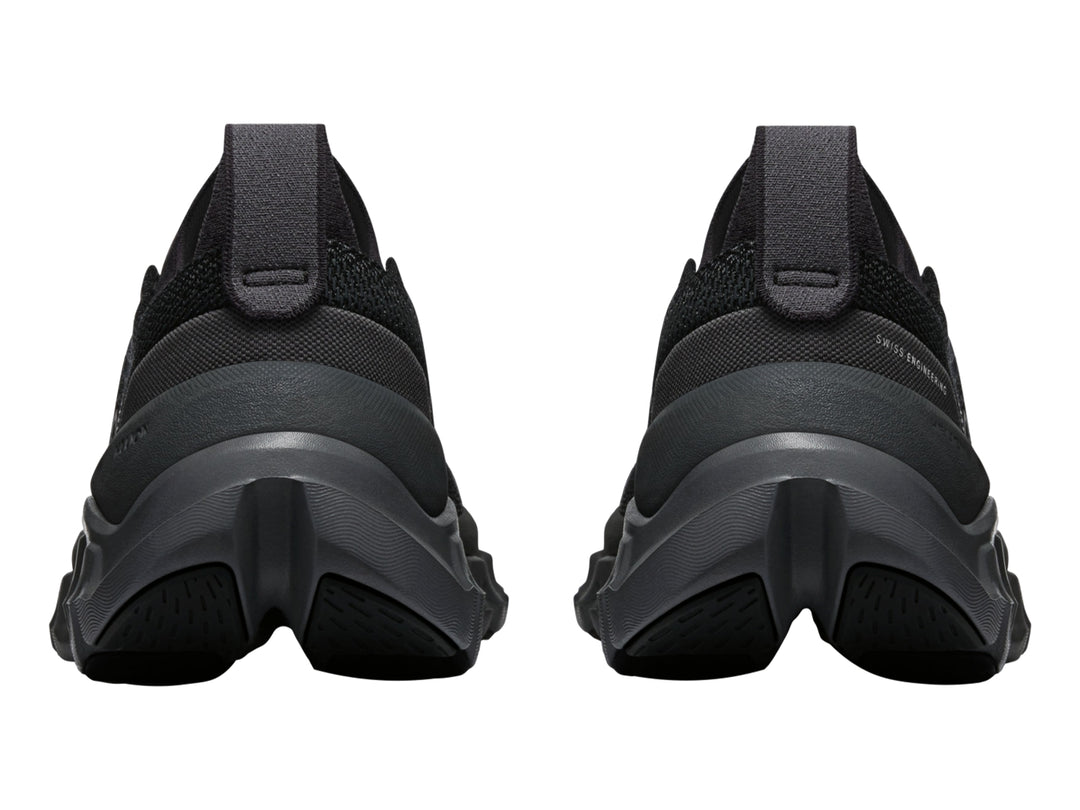 Tenis deportivos On Cloud X Tempo color negro con suela gruesa y tejido transpirable para mujer.