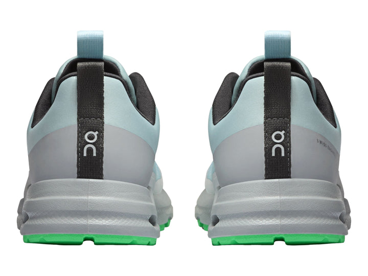 Tenis deportivos On Cloud Cloudhero para niño en color azul glaciario y gris con detalles en verde neón.