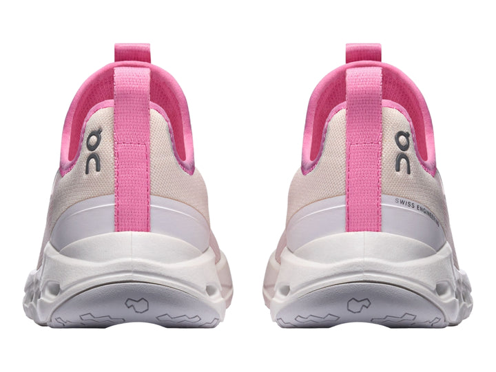 Tenis deportivos On Cloud Cloudleap para niña en color rosa y blanco con suela blanca.