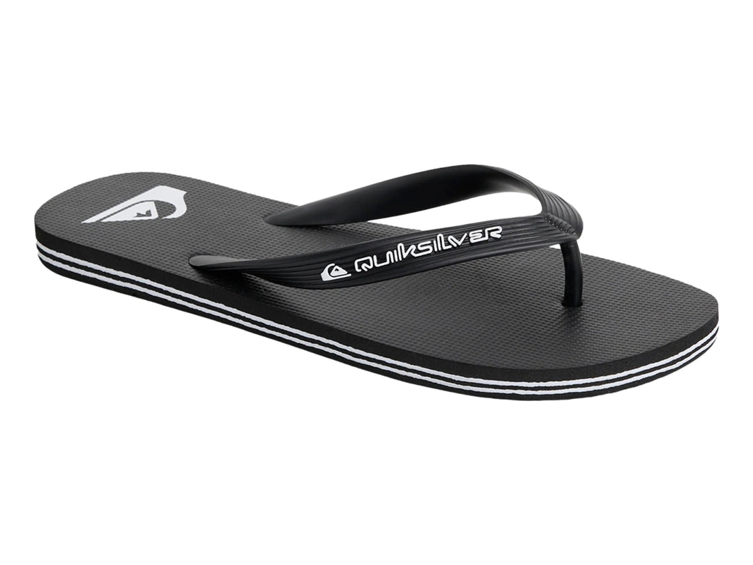 Sandalia Quiksilver Moncata Core color negro con una línea blanca decorativa en la suela.