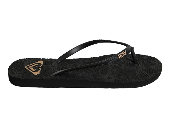 Sandalia Roxy Antilles III color negro con relieve floral en la suela y detalles dorados.