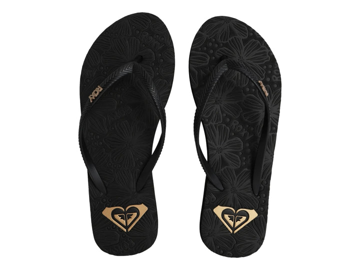 Sandalia Roxy Antilles III color negro con relieve floral en la suela y detalles dorados.