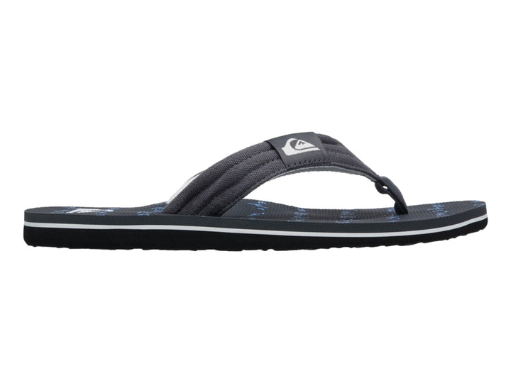 Sandalia Quiksilver Molokai Layback color negro con detalle blanco en la suela y correa de tela.