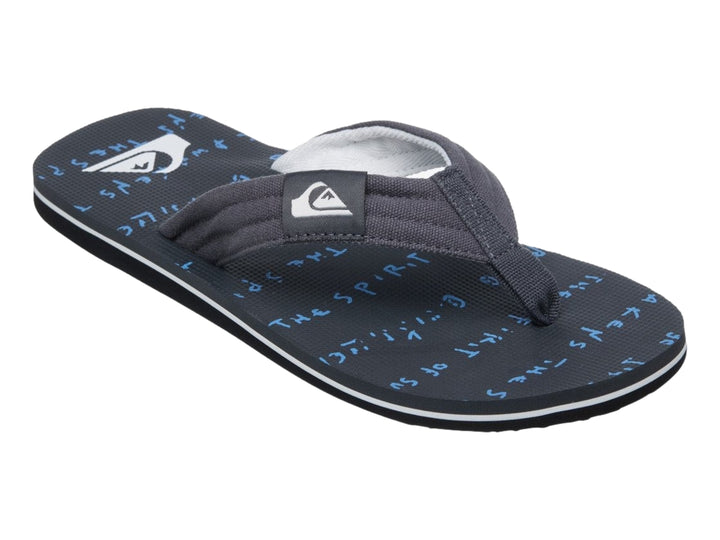 Sandalia Quiksilver Molokai Layback color negro con detalle blanco en la suela y correa de tela.